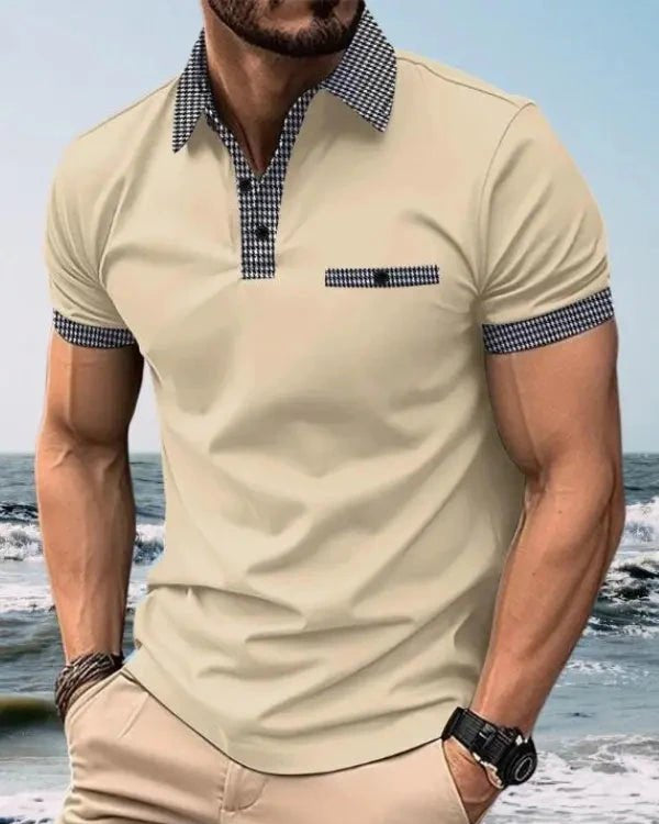 Man wearing a beige polo shirt and pants on a beach