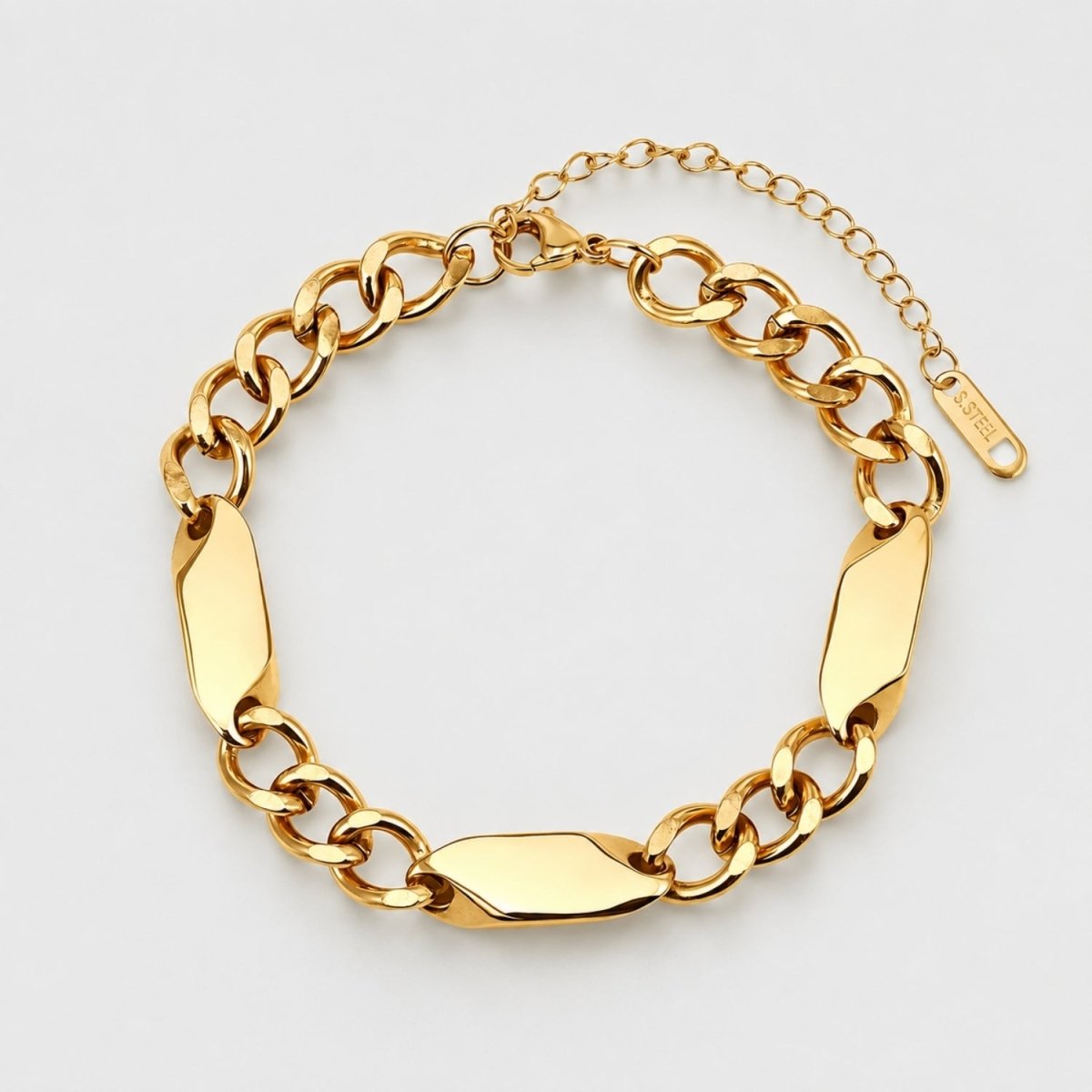 18k gold plated chunky chain statement bracelet with smooth geometric links on a white background
