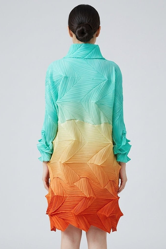 Back view of the Fenlo Form ombre pleated maxi dress showing structural high neck and cascading geometric 3D pleats.