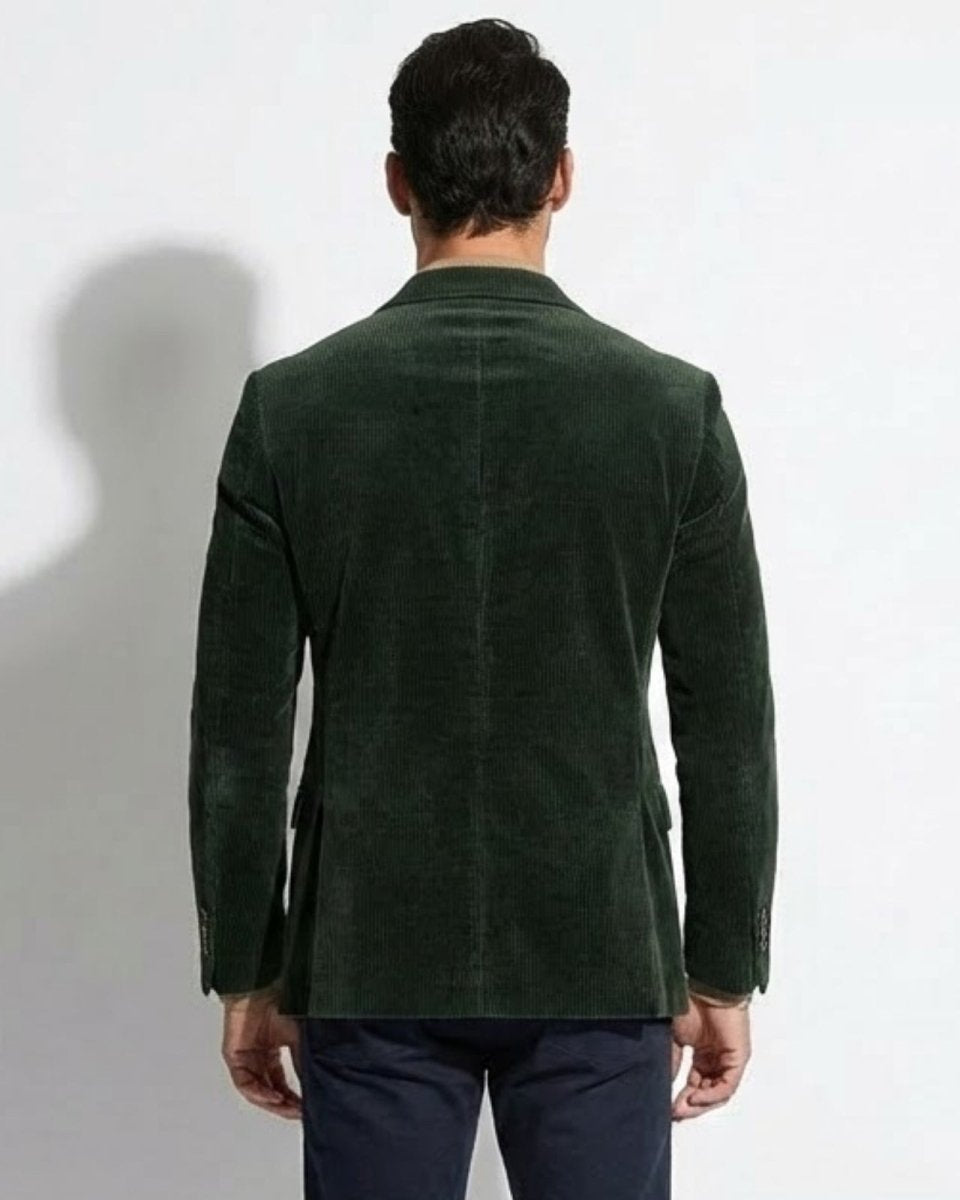 Back view of the men's green grady blazer, showing the double vent detail and tailored fit across the shoulders.
