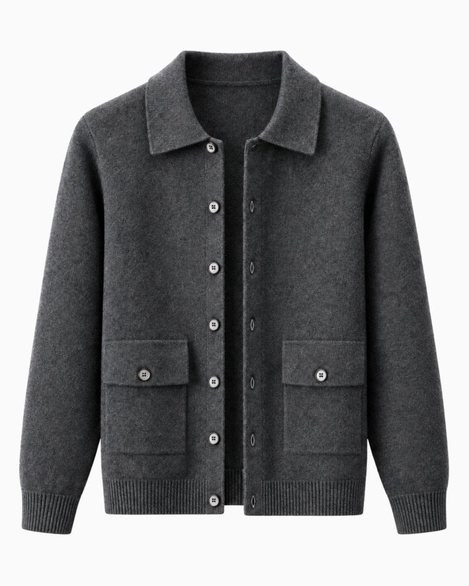 A dark gray knit cardigan sweater with a pointed collar, button-front closure, and two front flap pockets, shown on a plain light background.