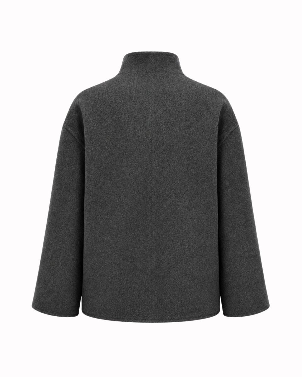 A dark gray wool coat with a high mock neck collar and long sleeves, shown from the back on a plain white background.