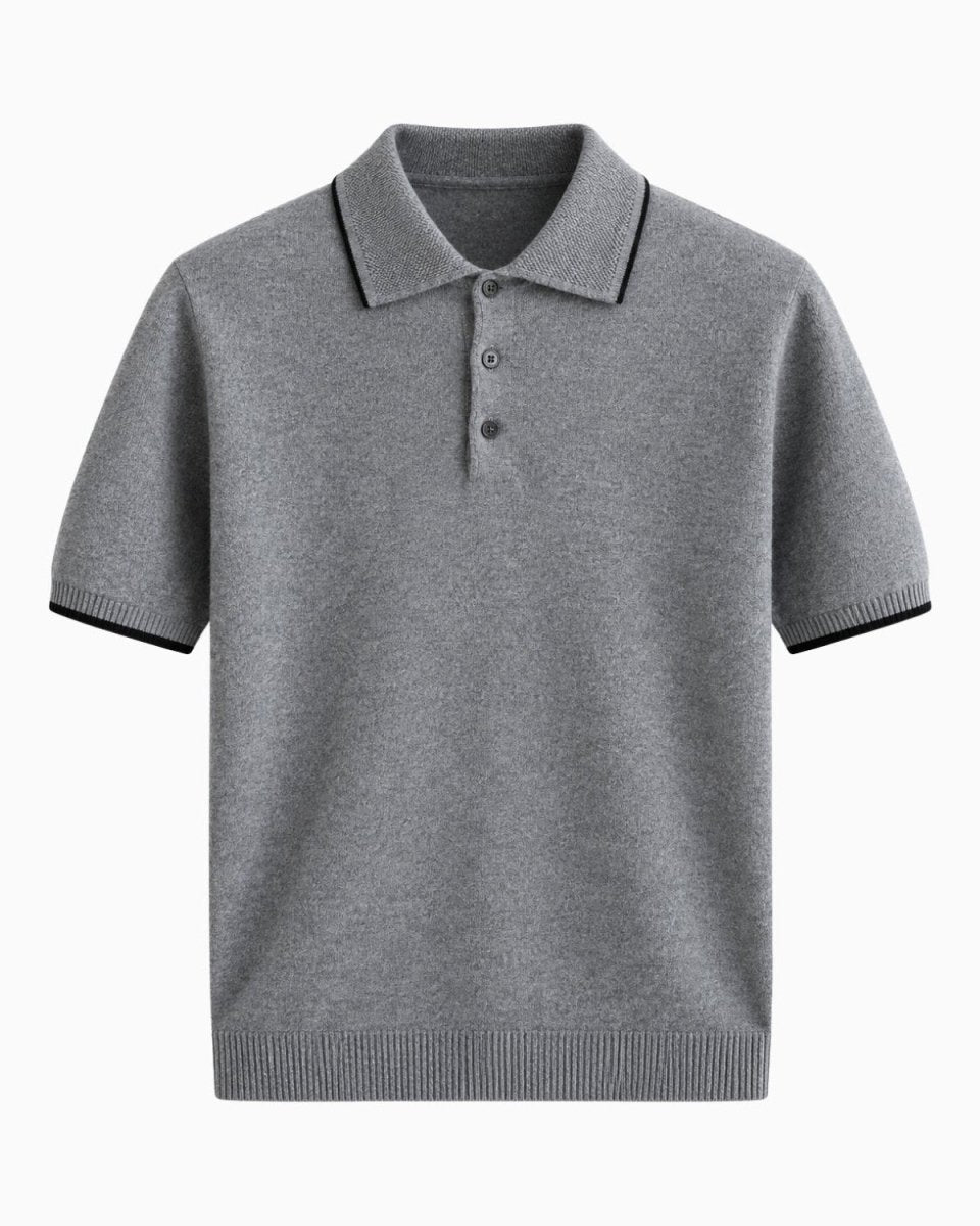 A short-sleeve knit polo shirt in heather gray with black trim on the collar, sleeve cuffs, and hem, featuring a three-button placket, shown against a plain white background.