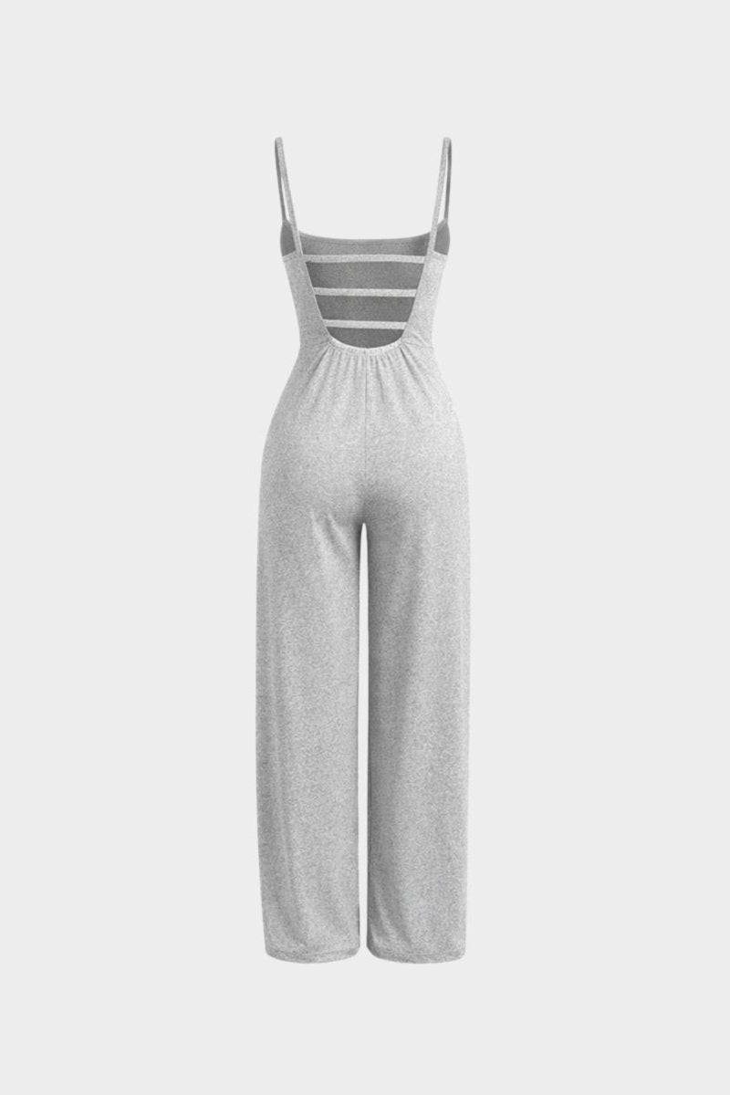 Flat lay back view of light grey wide leg jumpsuit showing open back multi-strap design