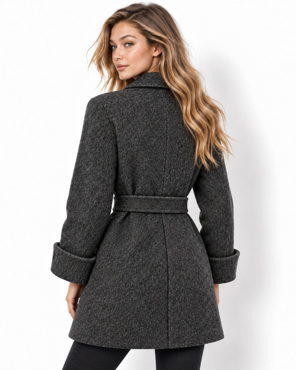 A woman modeling a dark gray textured belted coat from the back, shown against a plain white studio background.