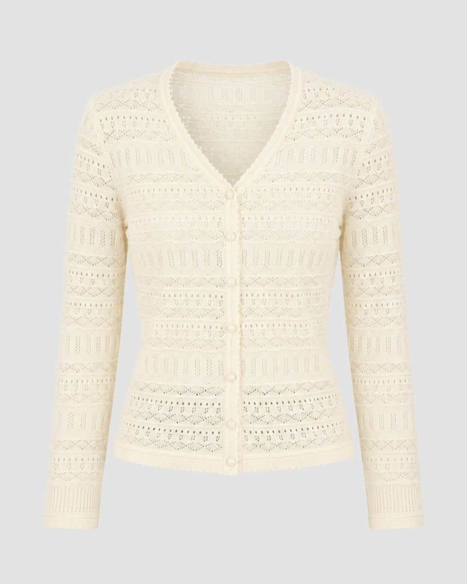 Ivory lightweight pointelle knit sweater with tonal buttons and scalloped trim