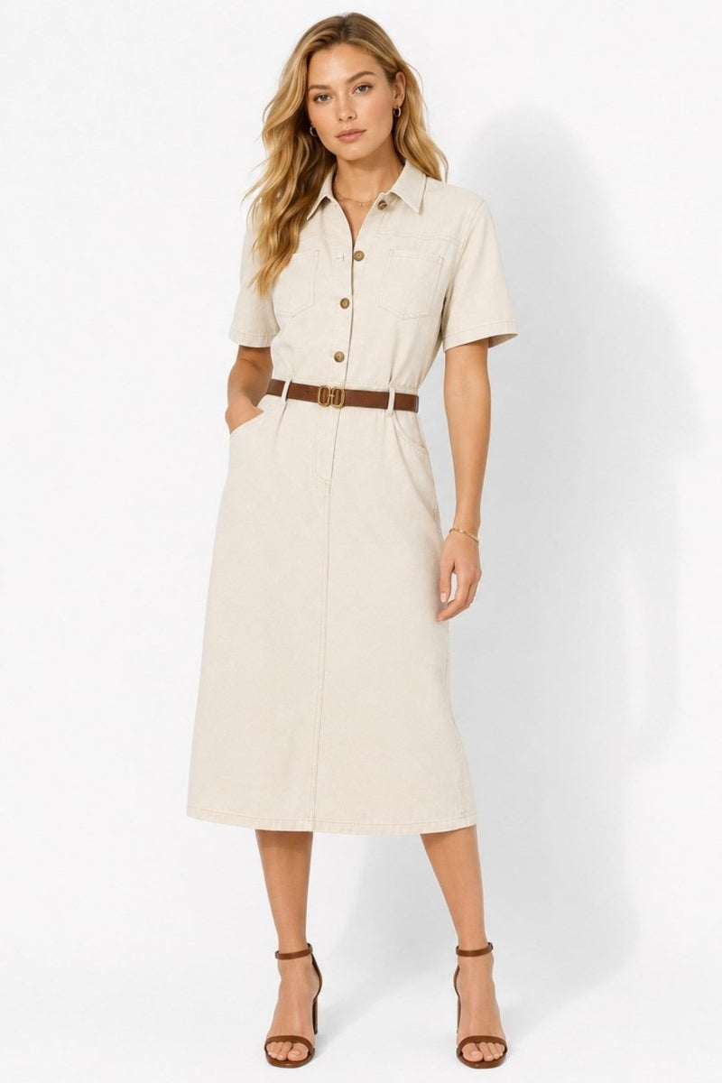 Woman wearing Kouvr ivory short sleeve utility midi shirt dress with brown belt facing forward.