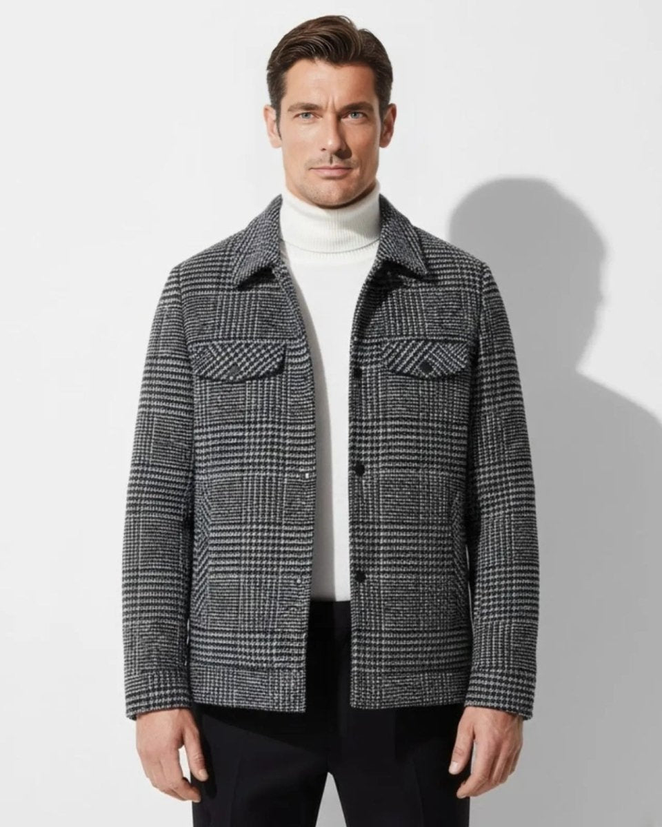 Model wearing the Kensington men's Joseph Plaid wool-blend overshirt in gray layered over a white turtleneck.