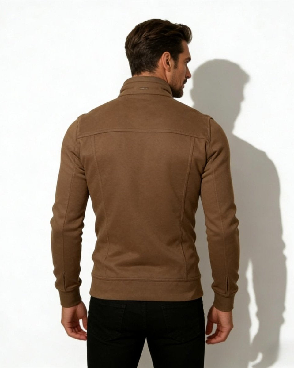 Back view of a male model in the Kent brown jacket, highlighting the structured shoulder and back yoke detailing.