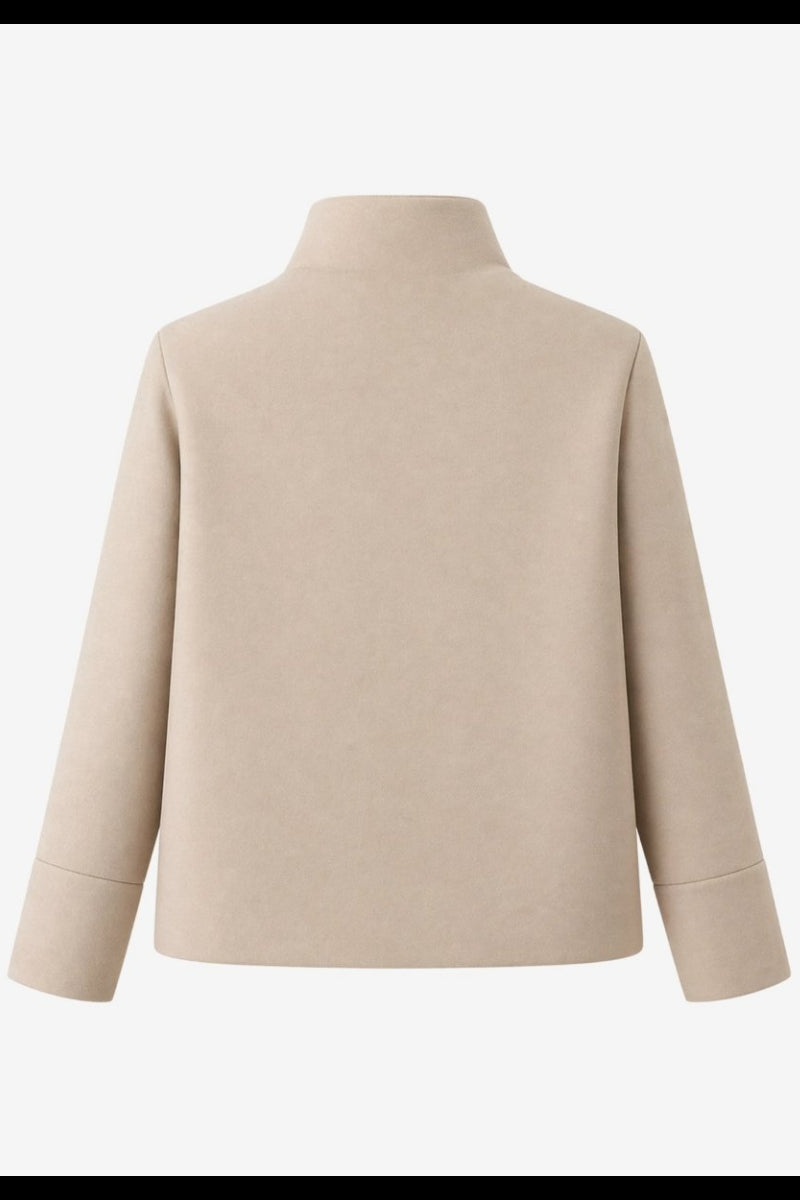 Flat lay back view of the minimalist beige outerwear jacket by Fenlo Form.