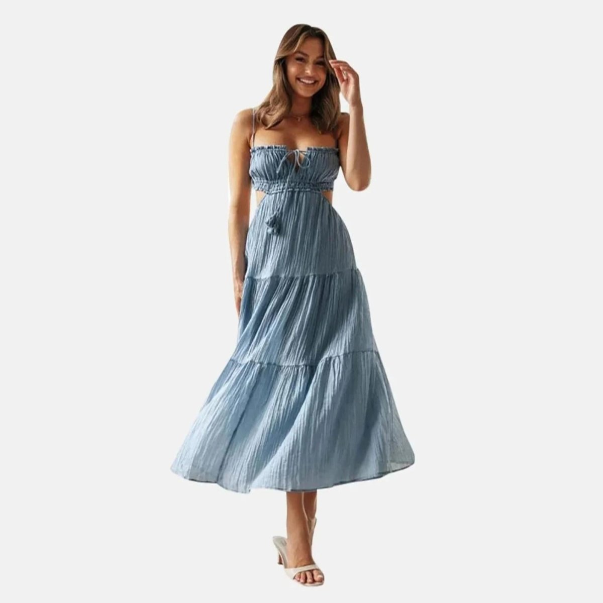 Model wearing the Amelia blue cutout tiered maxi dress, front view.