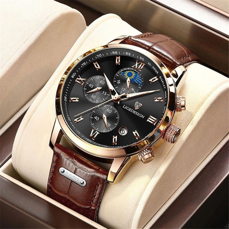 A man wearing the Kouvr Dexter Chronograph watch with a rose gold case and brown leather strap, paired with a business suit.