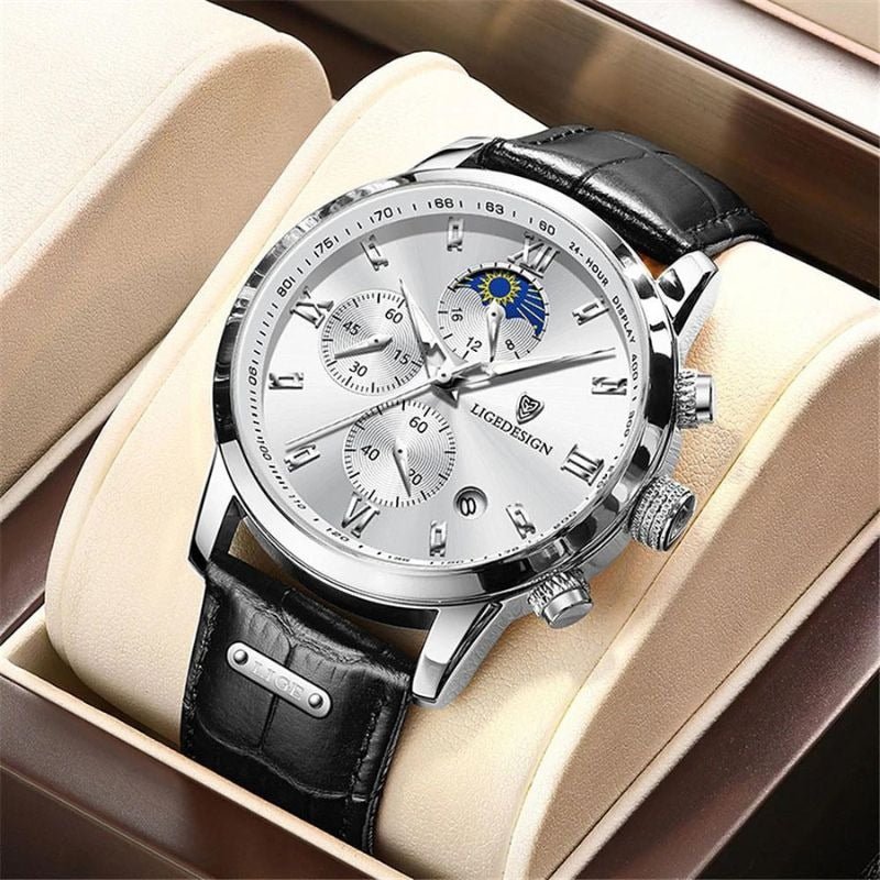 Kouvr Dexter Chronograph watch with a white dial and silver case, shown in its official packaging.

