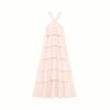 Pink Kouvr lace dress on a hanger against a white background