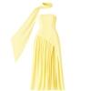 Yellow Kouvr evening gown with a long train on a plain background