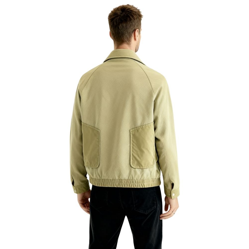 Model wearing the Kouvr Fashion Aiken corduroy shacket in khaki 