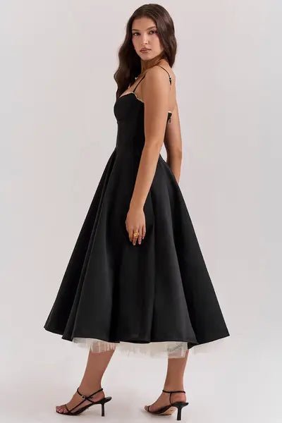 cinched waist," "voluminous skirt," "fit and flare silhouette," "sophisticated," "formal attire," and "special occasion