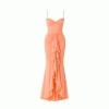 Peach-colored evening gown with ruffled skirt on a white background