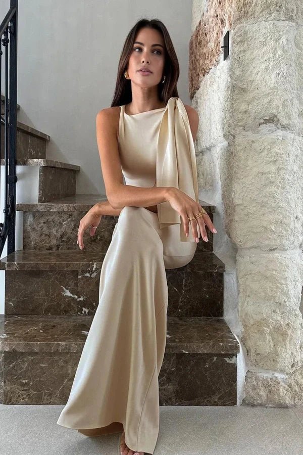 Grecian drape," "minimalist silhouette," "bodycon fit