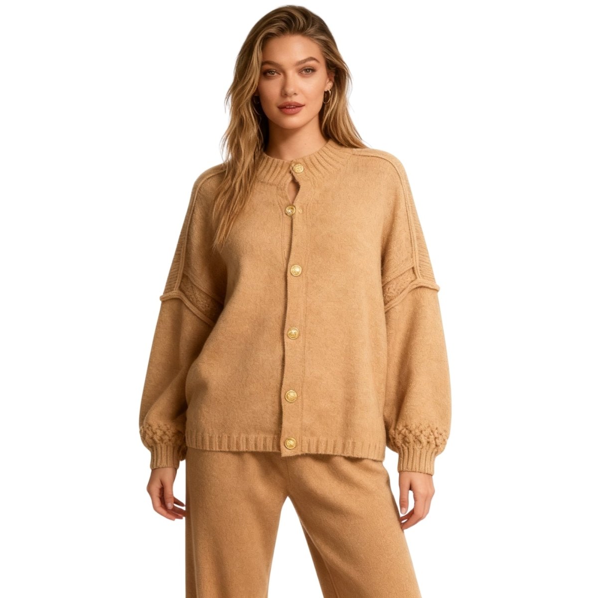 Woman wearing a Khaki Kouvr sweater and pants set on a white background