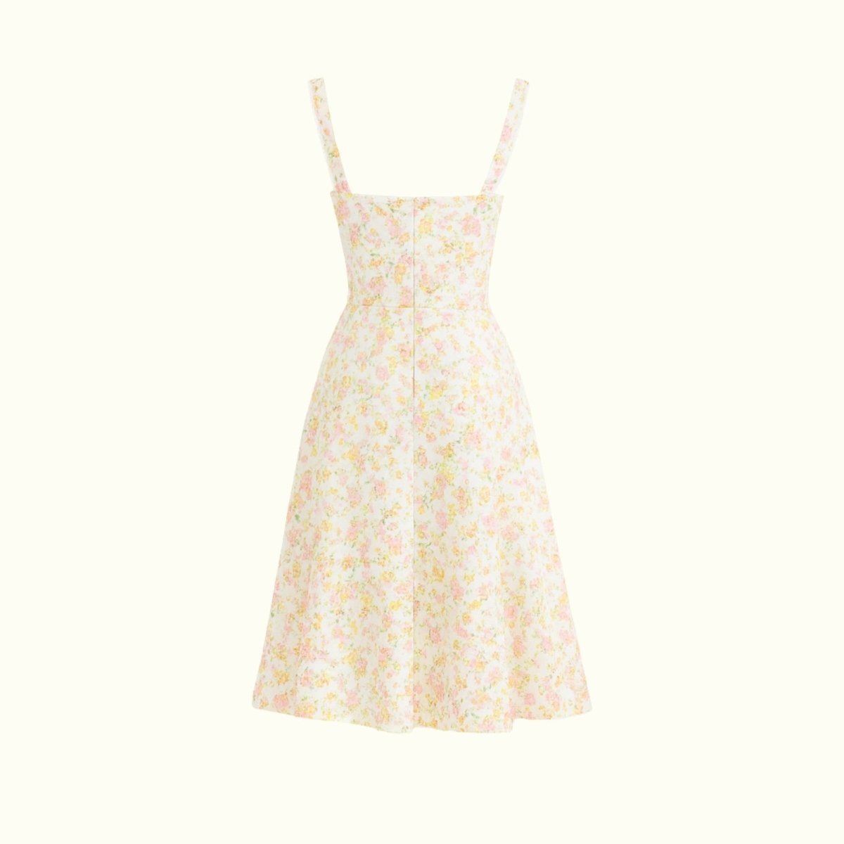 Close-up detail of the sweetheart neckline, tie-front feature, and jacquard fabric of the yellow rose floral midi dress.