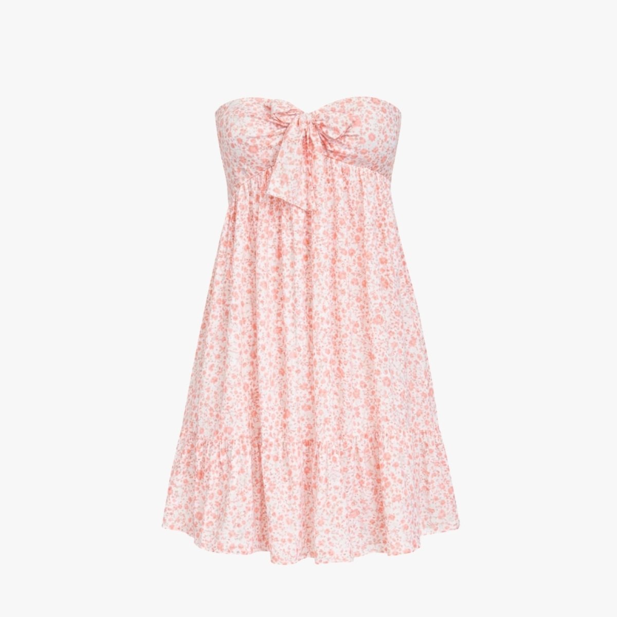 Flat lay of the orange floral strapless mini dress showing the bow-tie front, sweetheart neckline, and tiered skirt design. 