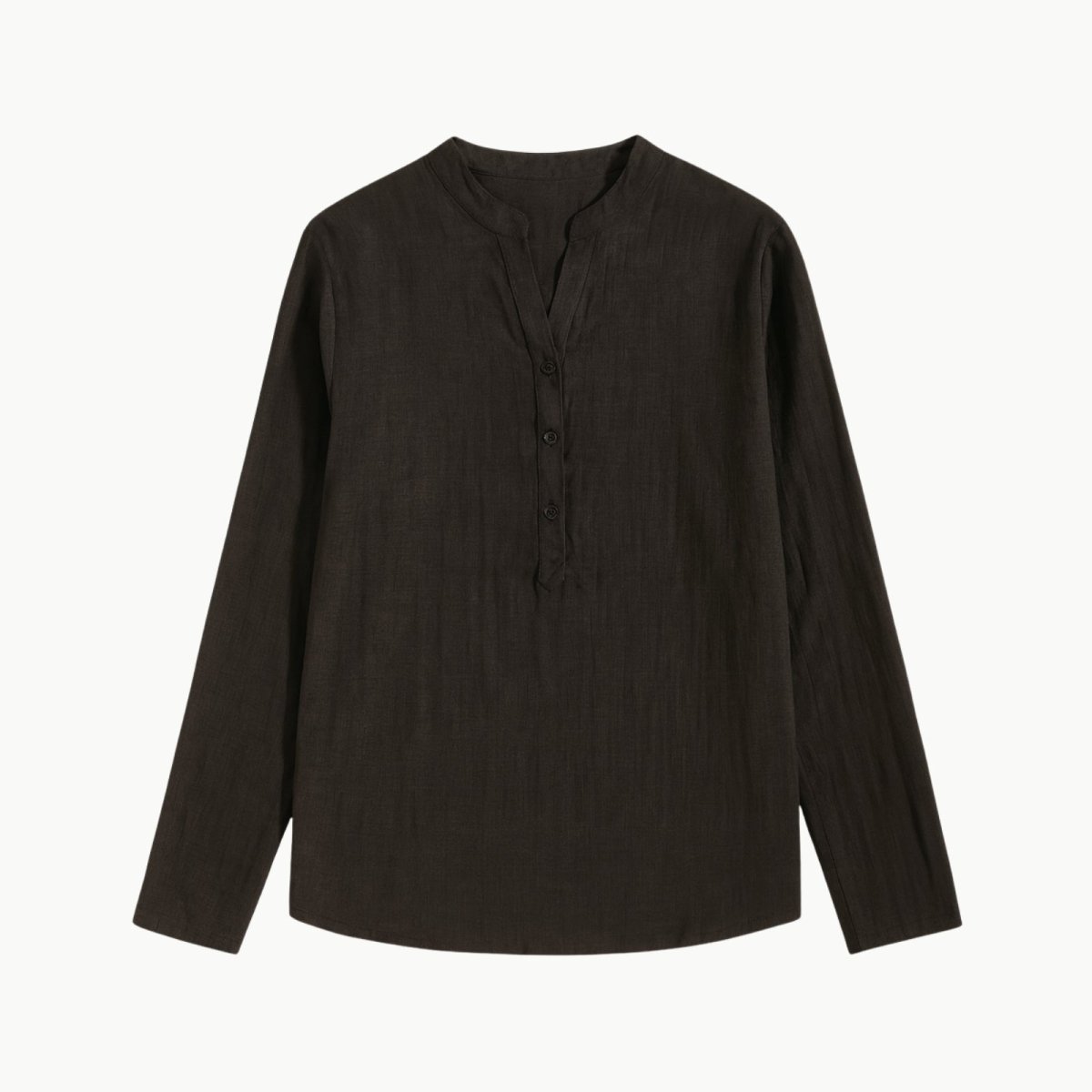 Flat lay photo of the front of a men's black long sleeve henley shirt with a band collar, showing the button placket and fabric texture. 