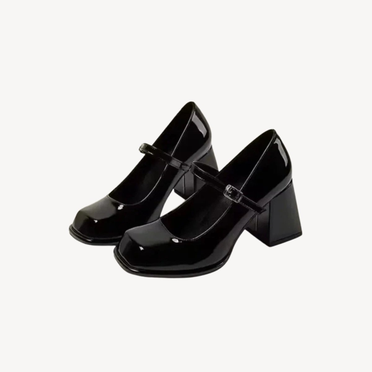 Front-angled shot of the Kouvr Sabrina black patent, emphasizing the sharp square toe design and high-shine patent material.