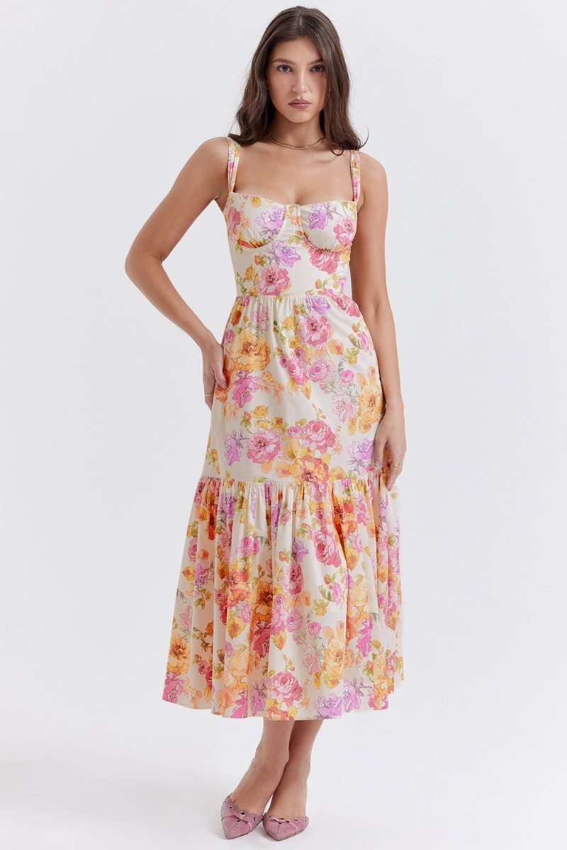 Woman wearing a floral dress on a white background