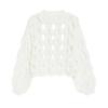 Flatlay product shot of the Kouvr Fashion white cutout chunky knit sweater, front side, on a light grey background.