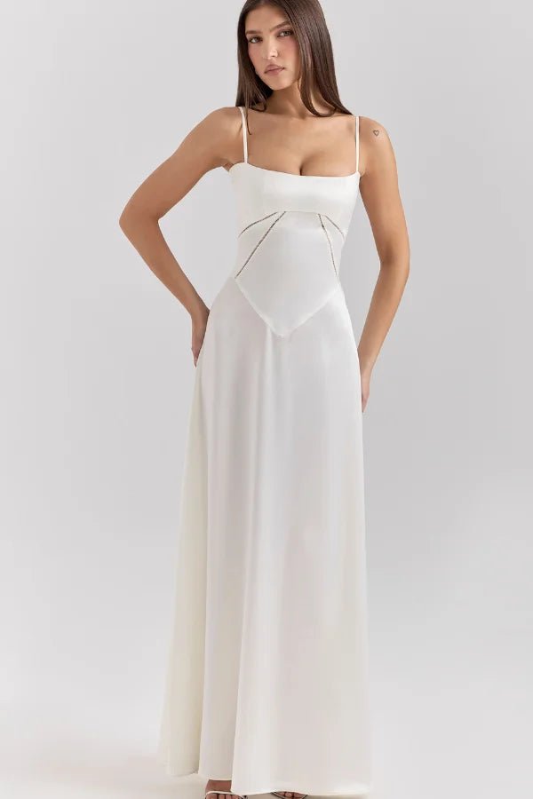 Model wearing the Kouvr Gabriella ivory silk corset back bridal gown.