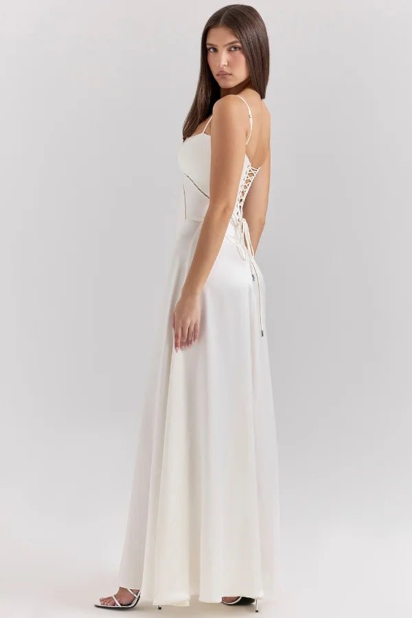 Model wearing the Kouvr Gabriella ivory silk corset back bridal gown.