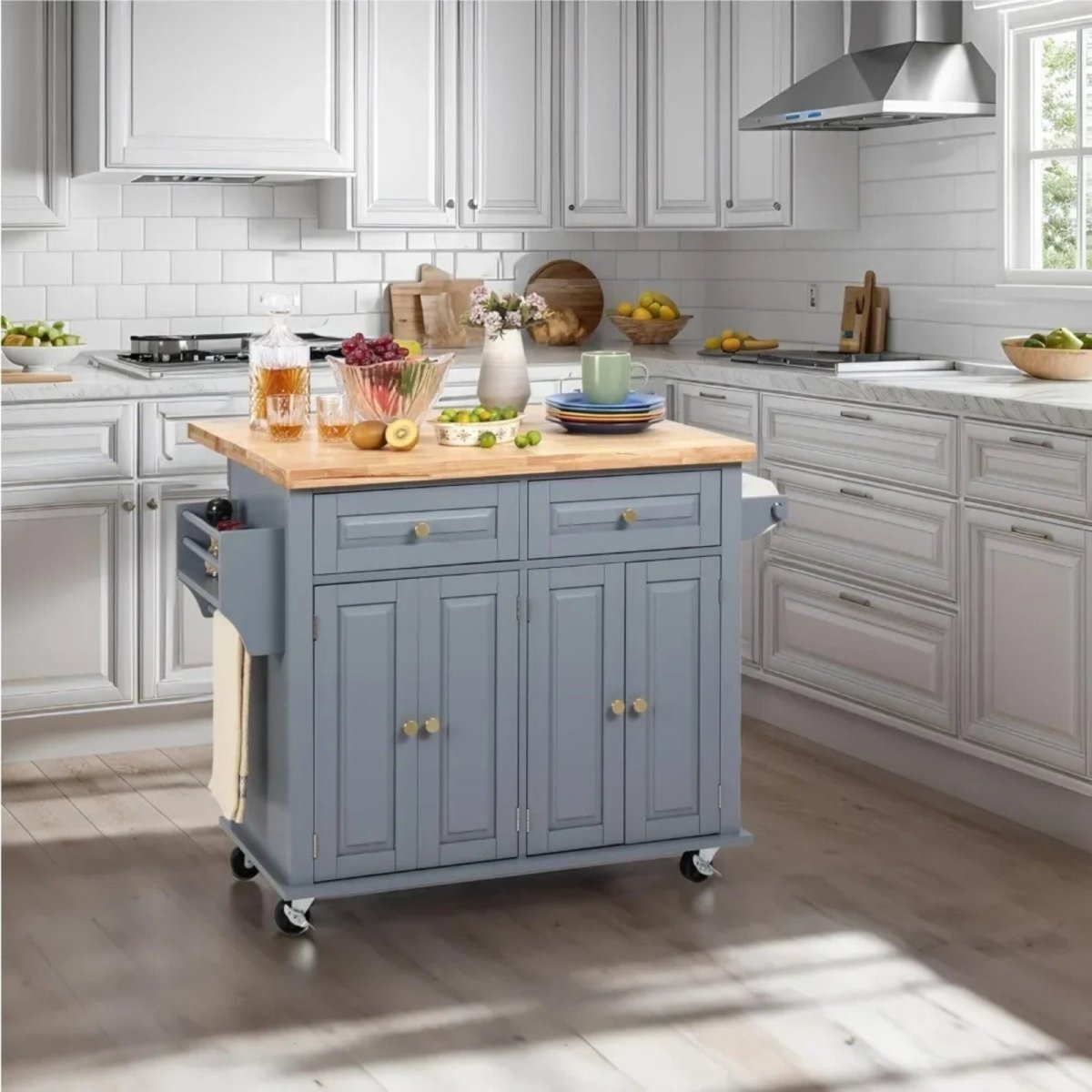 Kitchen island with wooden top and grey kouvr base in a modern kitchen setting