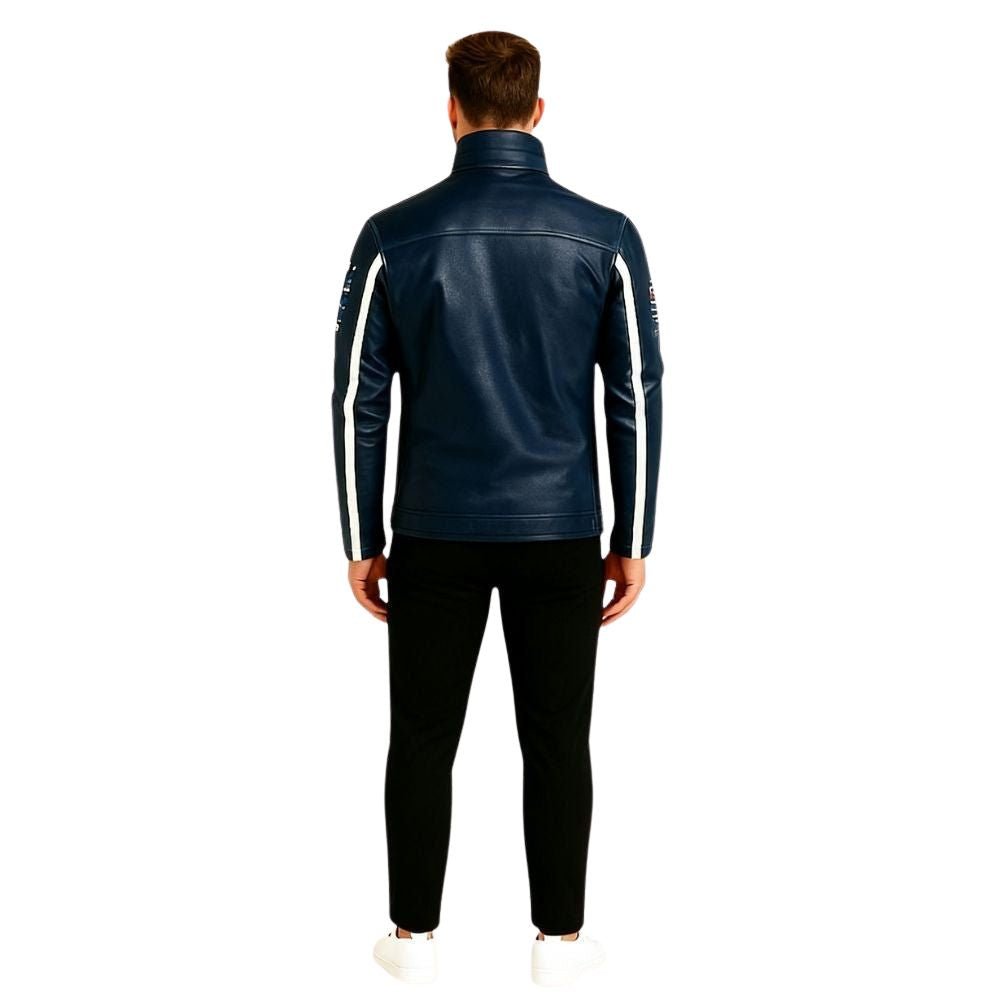 Man wearing a navy blue kouvr tracksuit with white stripes on a white background
