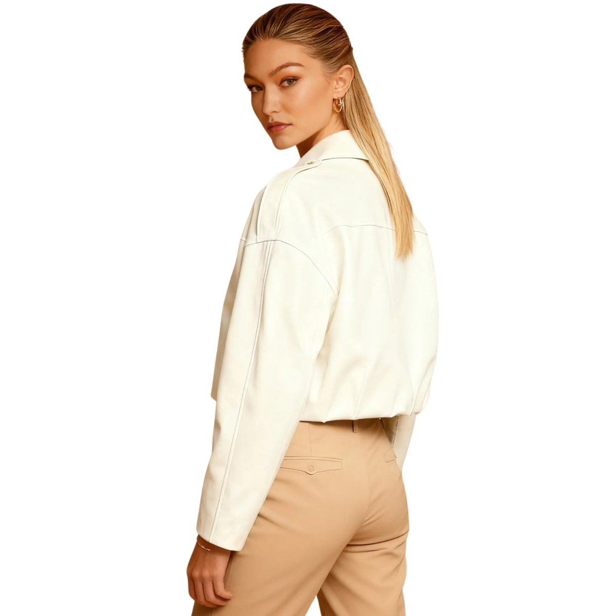 Model wearing the Kouvr Leilani white cropped faux leather jacket