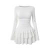Flatlay studio shot of the front of the Kouvr Leona white long sleeve tiered ruffle mini dress.