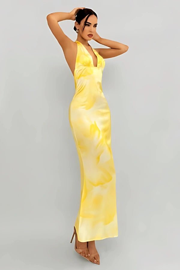 bias cut," "silk charmeuse," "plunge neckline," "floor-length," "elegant," "flowy," "cocktail attire," "destination wedding