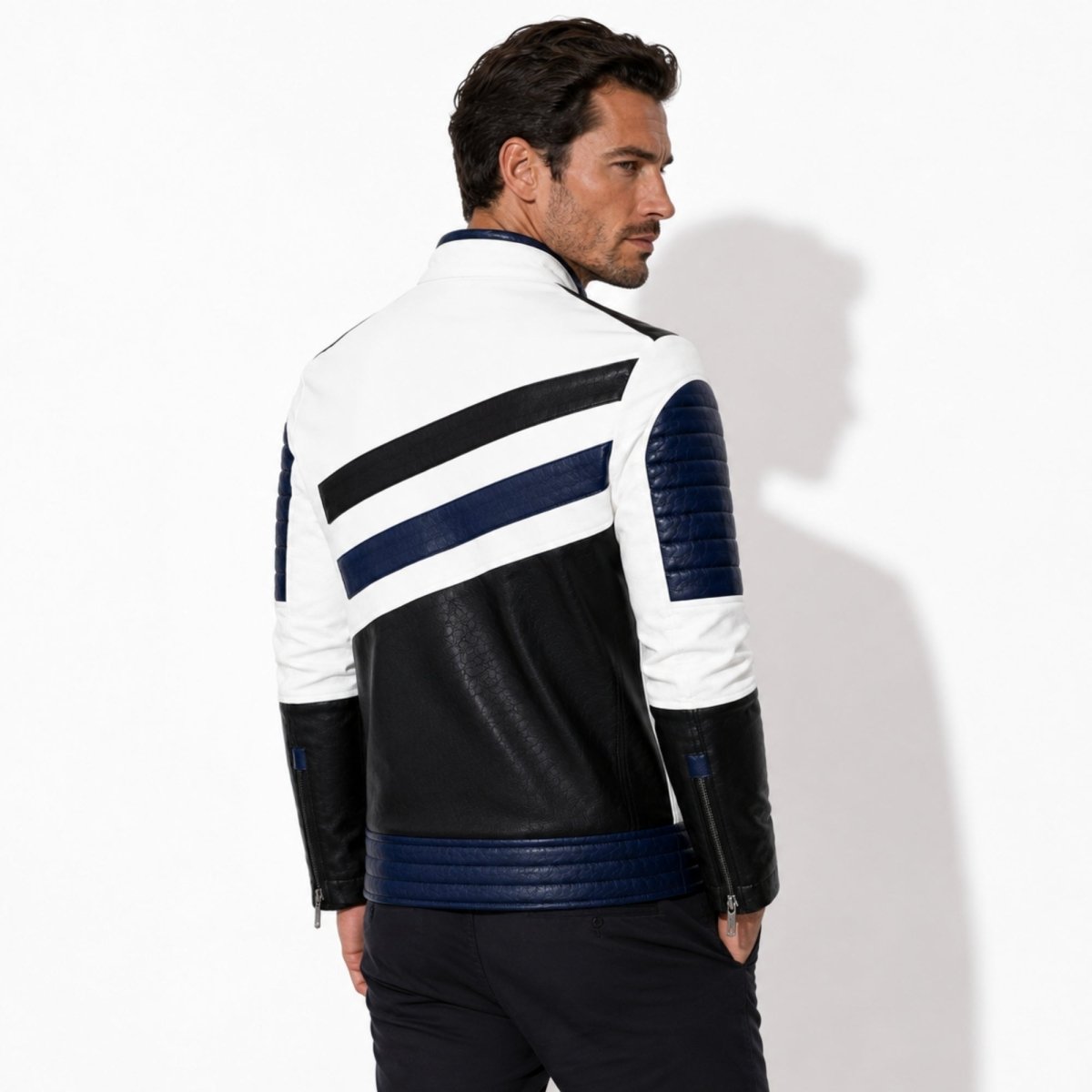 Back view of the Kouvr men's leather racing jacket highlighting the dynamic diagonal navy blue stripes and protective quilted lumbar paneling.