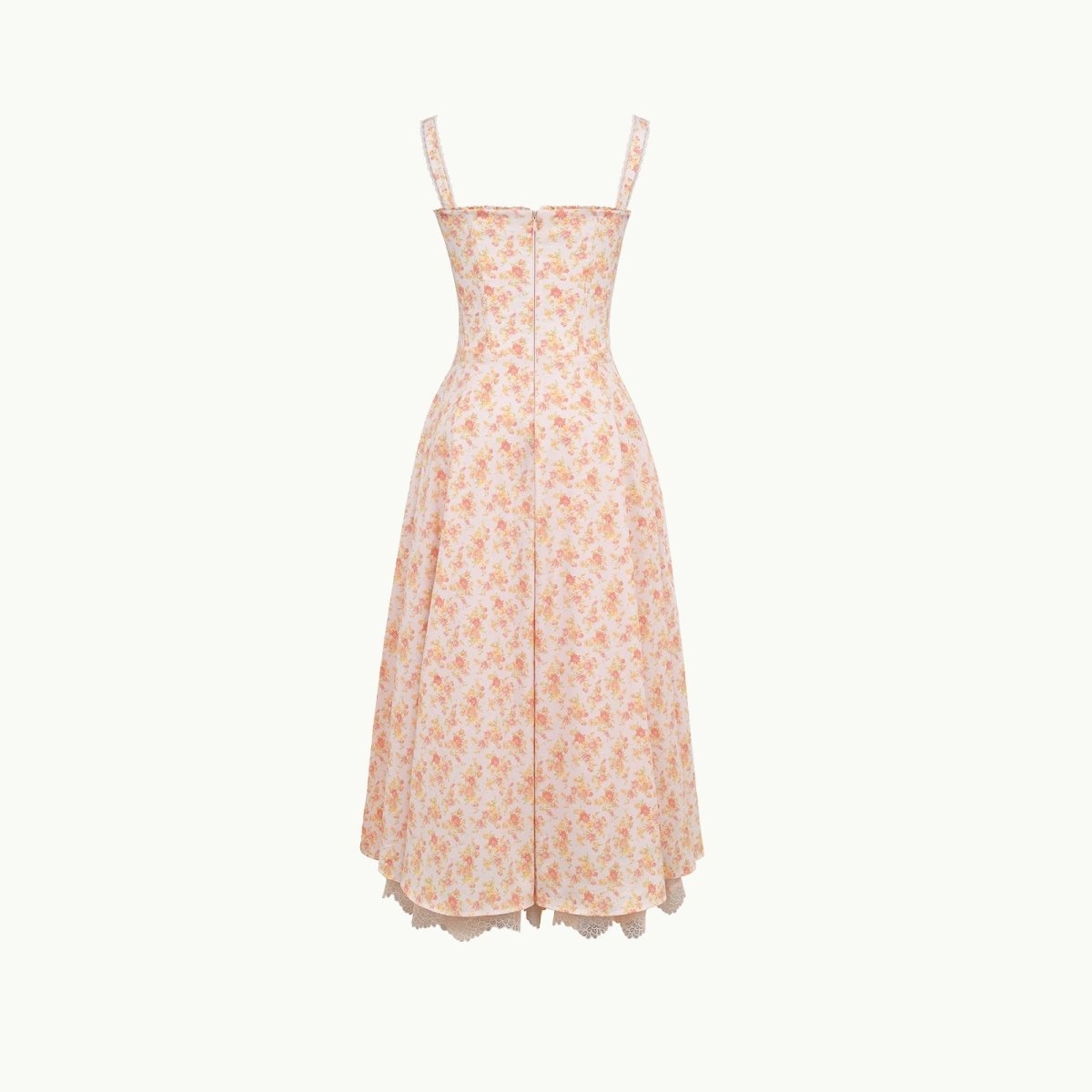 Close-up detail of the sweetheart neckline, tie-front feature, and jacquard fabric of the yellow rose floral midi dress.
