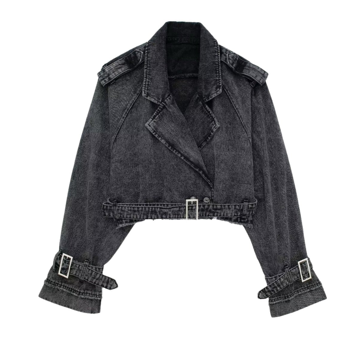 Woman wearing a black kouvr denim jacket with fringe details on a white background