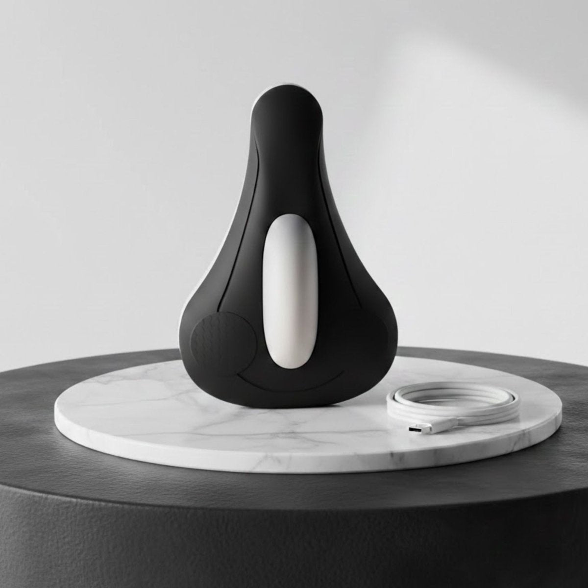 Matte Black Kouvr PC muscle vibration massager made from medical-grade eco-smart silicone.