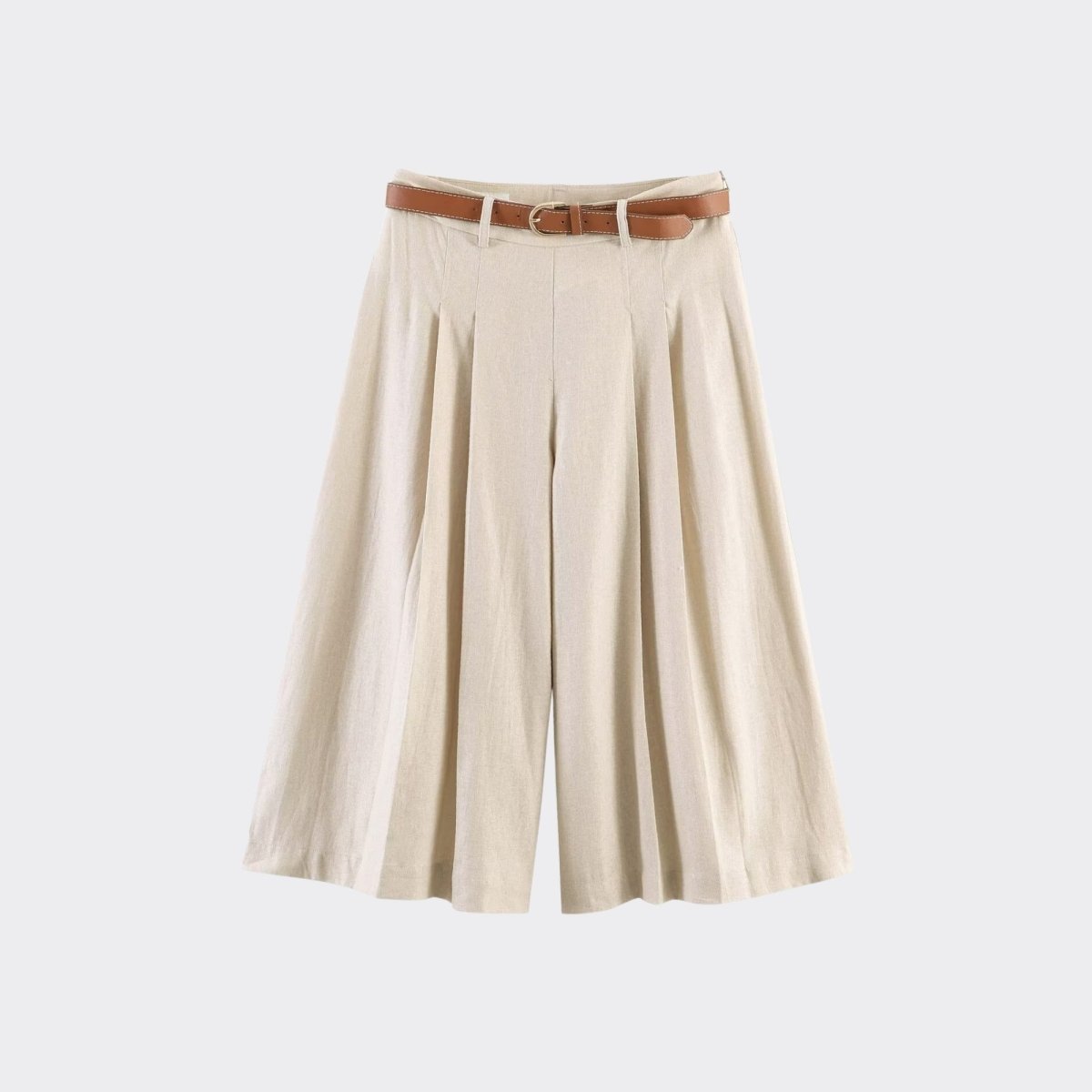 Flat lay studio shot of beige linen cropped wide leg pants featuring crisp front pleats and included brown belt.