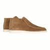 A pair of men's brown suede loafer boots with white soles, displayed against a clean, white studio background to show product details.