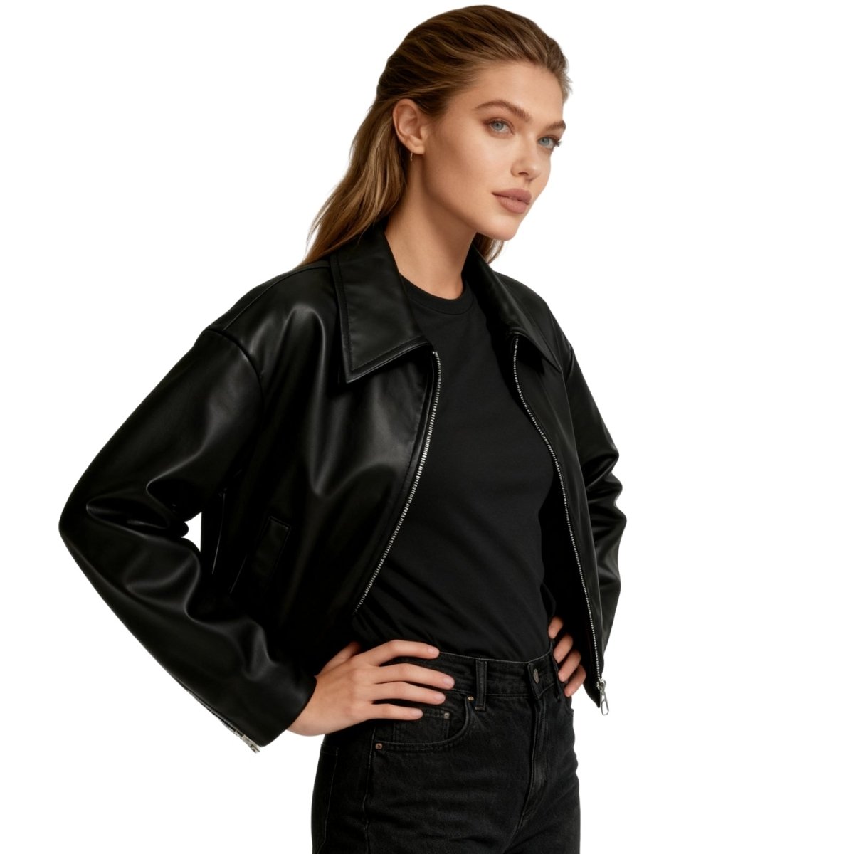 Woman wearing a Kouvr black leather jacket over a black shirt on a white background