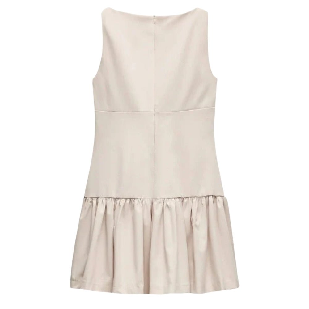 Ivory Kouvr  sleeveless dress on a white background