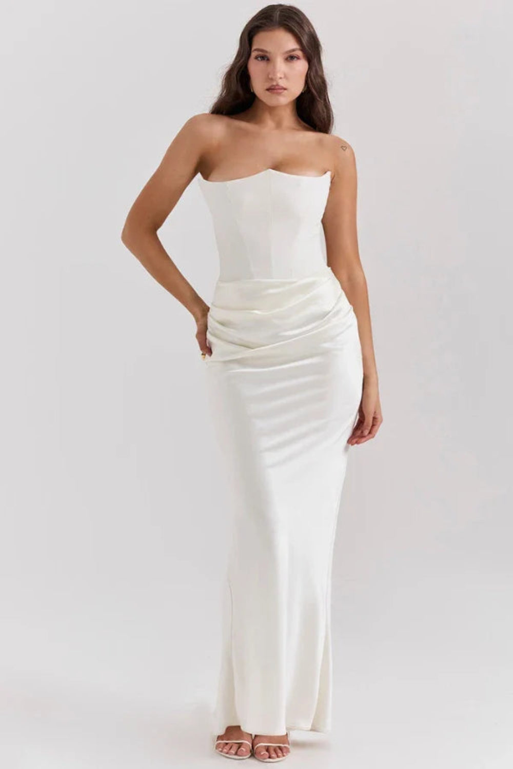 sculptural silhouette, boned bodice, asymmetrical draping, column skirt, heavyweight satin, minimalist evening wear