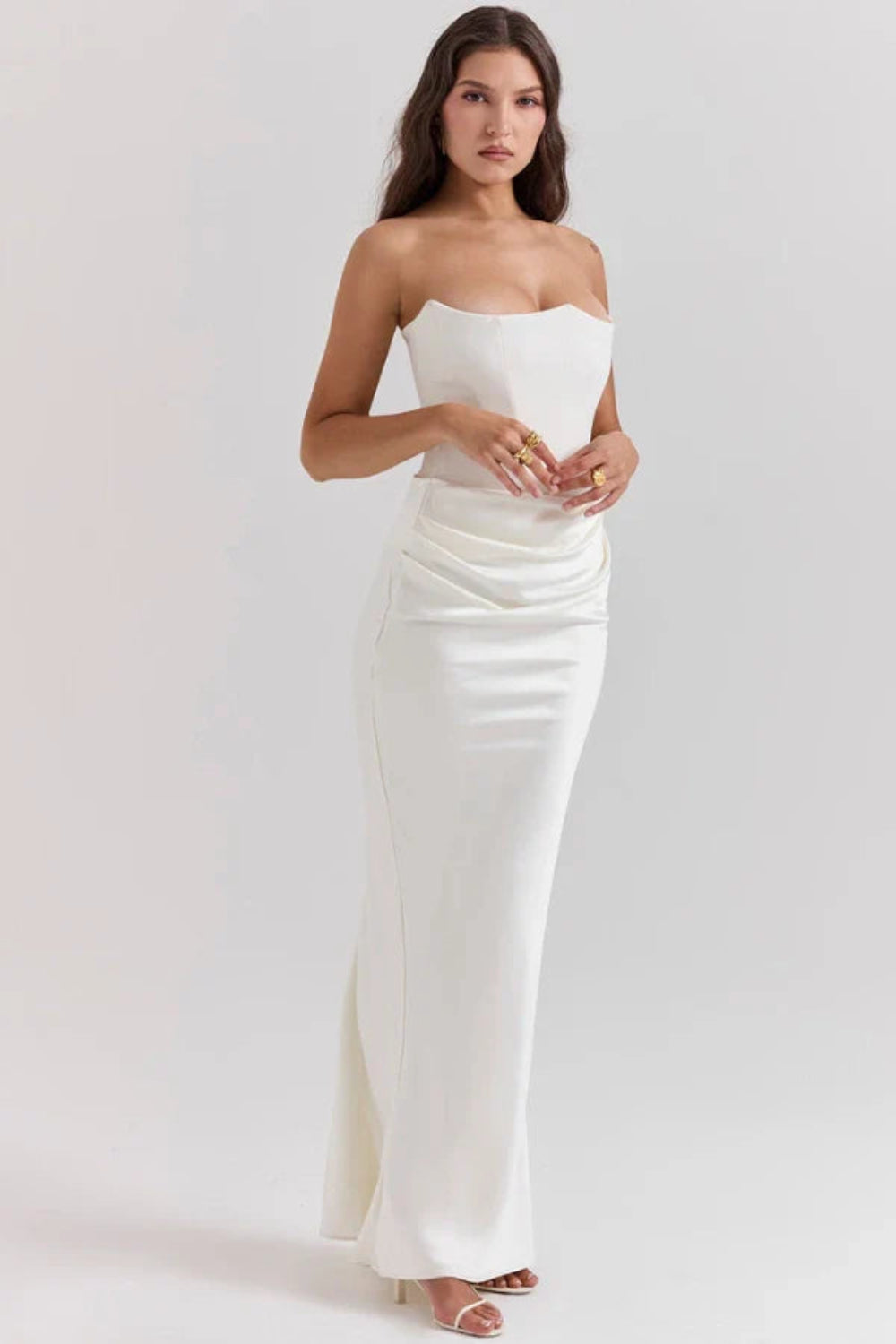 sculptural silhouette, boned bodice, asymmetrical draping, column skirt, heavyweight satin, minimalist evening wear