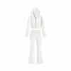 Flatlay of the white knit co-ord set featuring a cropped full-zip hoodie and matching high-waisted flared pants on a white background.