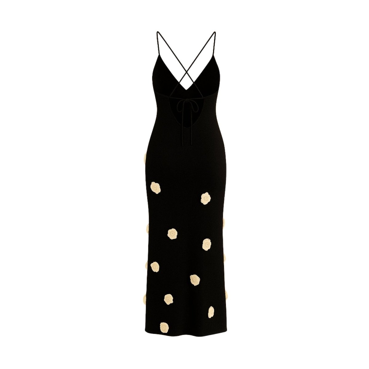 Black dress with gold polka dots on a white background