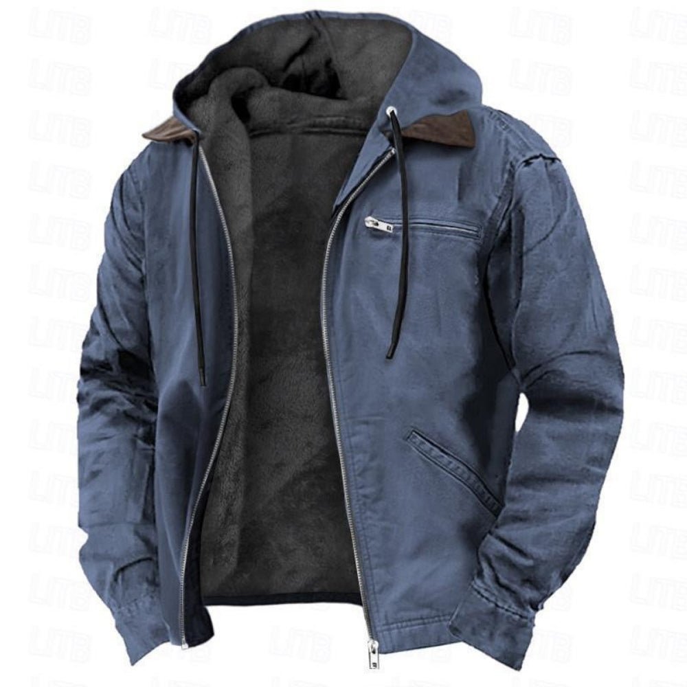 Close-up product view of the Kouvr Tyrian jacket in blue, showing the open zipper and plush black sherpa fleece lining.